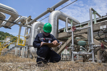 Male worker inspection pipeline oil