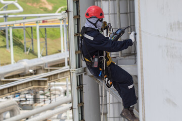 Male worker rope access  inspection