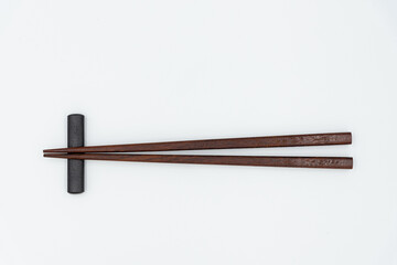 Isolated wooden chopsticks on white background