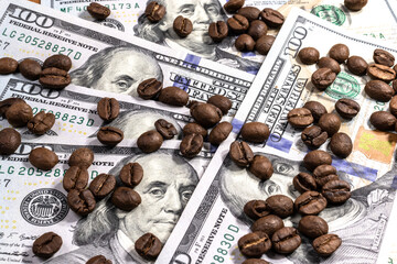 US dollars cash money and roasted coffee beans in Brazil