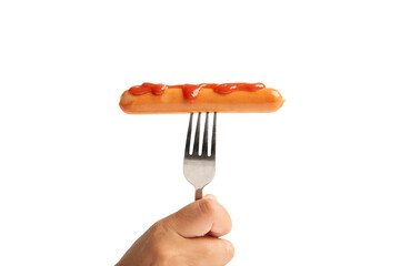 Hand holding a fork with grilled sausage isolated on white background.clipping path.