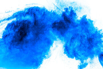 Bizarre forms of blue powder explosion cloud on white background.Launched blue dust particles splashing.
