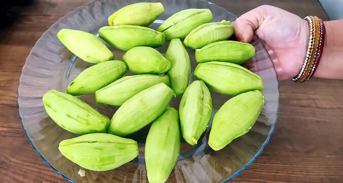 pile of peeled parval or Pointed gourd in a glass plate
