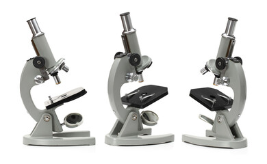 old microscope isolated on white background 