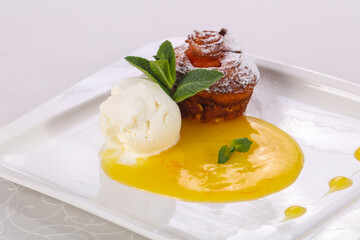 Tasty hot muffin with ice cream