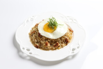 Japanese unagi fish wok garlic fried rice with fried egg and vegetables on white plate asian halal seafood menu