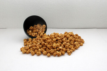 Microwave freshly made caramel popcorn with drinks, all ready to watch series, movies or tv shows
