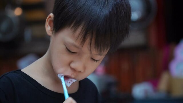 Little asian kids brushing teeth Dental health care concept.