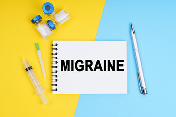A syringe, ampoules and a notebook with the inscription - MIGRAINE