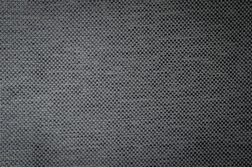Closeup  fabric sample texture backdrop.Fabric pattern. design or upholstery abstract background.Black linen canvas texture