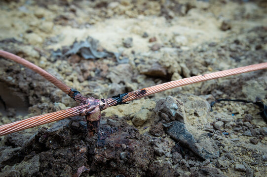 Welding copper ground wire on ground rod.Welding copper ground wire.Connect copper grounding lightning protection system. With the melting