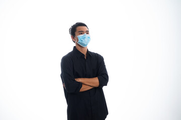 health, pandemic and safety concept - asian young man wearing face protective medical mask for protection from virus disease over white background
