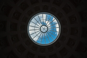 skylight. blue sky with clouds view through the window in the dome of the temple. Temple of Friendship. Pavlovsky Park. concept of hope and freedom