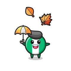 cartoon of the cute nigeria flag badge holding an umbrella in autumn