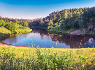 Moscow. June 19, 2021. Nice summer landscape in Meshchersky park. Great view of the pond in the evening.