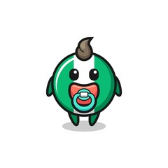 baby nigeria flag badge cartoon character with pacifier