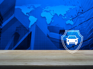 Car with shield flat icon on wooden table over world map, modern city tower and skyscraper, Business automobile insurance concept, Elements of this image furnished by NASA
