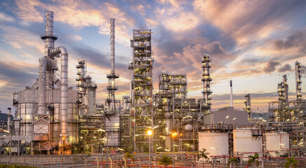 Fototapeta premium Oil and Gas Industrial zone,The equipment of oil refining,Close-up of industrial pipelines of an oil-refinery plant,Detail of oil pipeline with valves in large oil refinery.