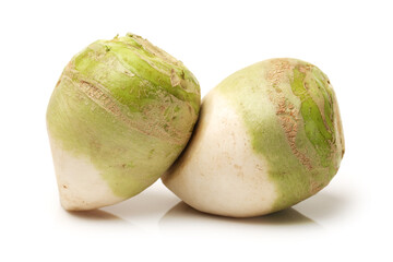 Fresh kohlrabi with green leaves on isolated white backround