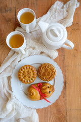 Chinese pastries eaten during Mid-Autumn Festival / Traditional Mooncake / Popular choice of salted egg yolk, red bean and lotus paste. The Chinese words represent red bean and lotus paste