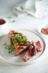 Grilled beef steak with herbs