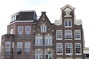 Fototapeta na wymiar Amsterdam Singel Traditional Brick House Facades