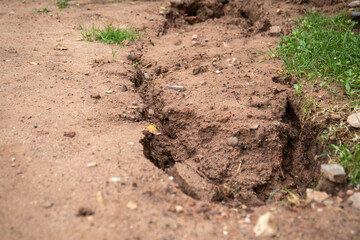 Rainwater flushed pits. Extreme weather and landslides