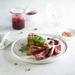 Grilled beef steak with herbs