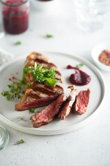 Grilled beef steak with herbs