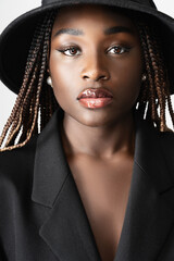 Beautiful elegant African American woman in a hat