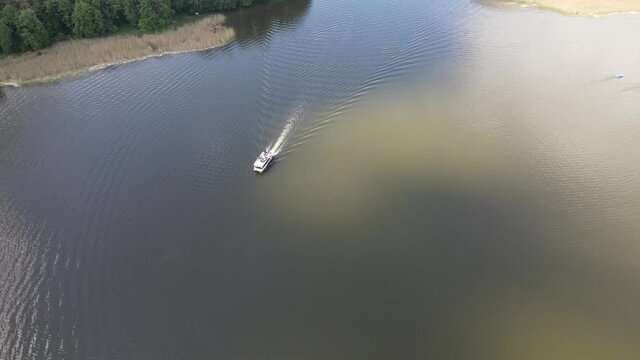 Top view of cruise ships on the Necko lake.Landscape from a drone on lakes Necko and Rospuda