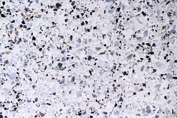 Old terrazzo  multicolored polished stone floor on background