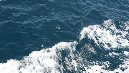 Wave and water splashes in the sea
