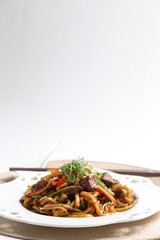 stir fried Japanese udon noodle mee in black pepper sauce with wagyu beef meat asian halal menu