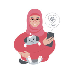 senior woman wearing a headscarf with a tiny dog searching for veterinarian online from smartphone.