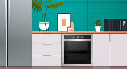 modern kitchen interior with new refrigerator oven and microvawe home appliances concept