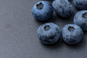 Harvested blueberry fruits (Slate Plate Background)