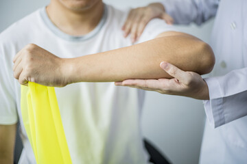 A professional physiotherapist is doing stretching for a patient, the patient has muscle dysfunction due to hard work, most often an office worker who has problems sitting for long periods of time.