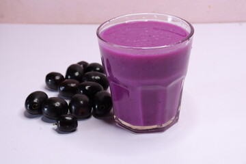 Jambolan plum or Java plum juice isolated on white background