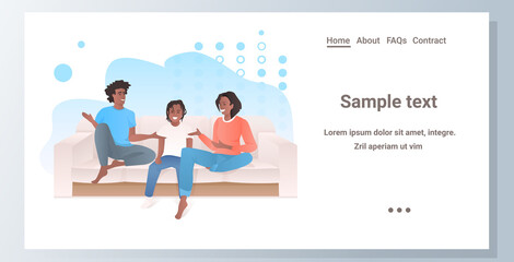 parents with little daughter sitting on couch family spending time together horizontal full length