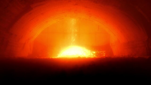 Roasting furnace. Industrial process of production of cement clinker or expanded clay. An industrial enterprise for the processing of cement. A red-hot furnace on the territory of a cement plant