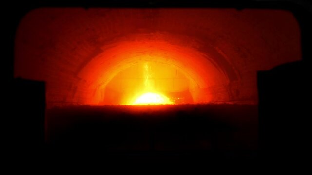 Roasting furnace. Industrial process of production of cement clinker or expanded clay. An industrial enterprise for the processing of cement. A red-hot furnace on the territory of a cement plant