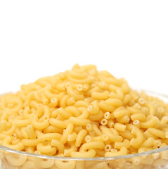 Italian pasta (Gomiti Rigati) on white background