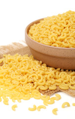 Italian pasta (Gomiti Rigati) on white background