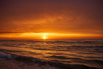 Orange sunset on the Baltic Sea in Leba - obrazy, fototapety, plakaty