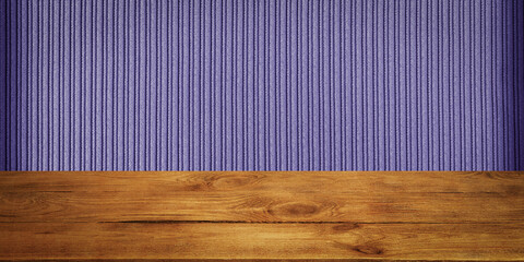 The background is blank wooden boards and a textured striped wall with gradient lighting and vignetting.