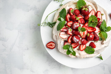 Cake Pavlova with whipped cream, fresh strawberrie and mint, banner, menu, recipe place for text, top view