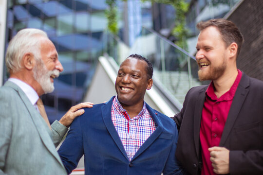 Three Business Men Talking. Perfect Business Team.