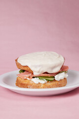 pancakes with fish, lettuce leaves and vegetables, a hot dish for lunch, pastries with sour cream