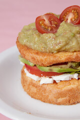 pancakes with meat and guacamole, lettuce leaves and vegetables, hot dish for lunch, pastries with sour cream